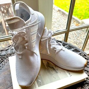 White on white Adidas sneaker.